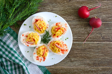 Deviled eggs. Delicious appetizer. Boiled eggs stuffed with yolk, mustard, mayonnaise, paprika....