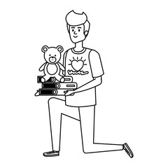 man volunteer with books and bear teddy