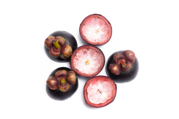 Mangosteen peel half cut isolated on white background. Mangosteen is a queen of fruit in Thailand. Mangosteen background. Mangosteen is a popular fruit in Thailand. Fruit peel.
