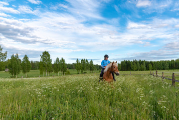 Woman horseback riding