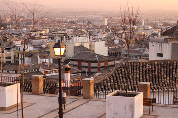 View to white houses of Granada city from the viewpoint in sunset, Andalusia, Granada, Spain