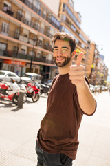 young man doing ok gesture