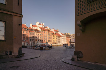 The old market square, or Rynek Starego Miasta in Polish, in the middle of Warsaw Old Town or Stare Miasto early in the morning.