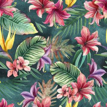 Watercolor seamless pattern of tropical flowers, palm and leaves on dark background