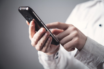 Business girl using smartphone. Technology