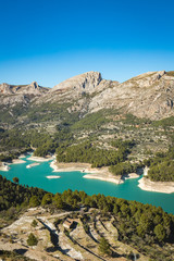 Naklejka na ściany i meble Wild nature with blue waters mountains and river near the castle of Guadalest in Alicante, Spain