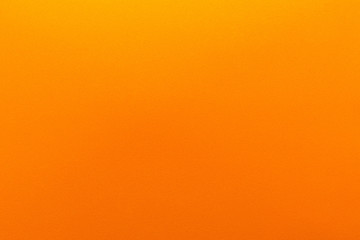 Orange gradient color with texture from real foam sponge paper for background, backdrop or design.