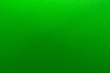 Green gradient color with texture from real foam sponge paper for background, backdrop or design.