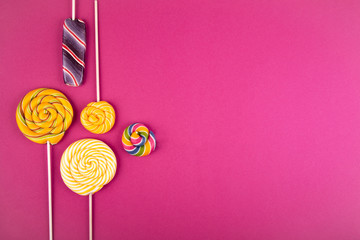 Many lollipops on the background.