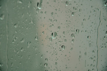 Raindrops on glass.