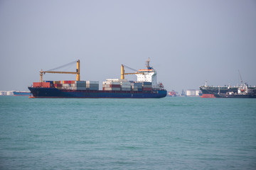 Container ships seen from southernmost point of continental Asia in Sentosa, Singapore