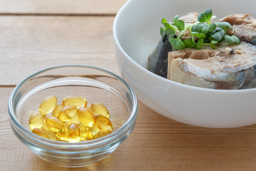 鯖の缶詰とDHAのサプリメント