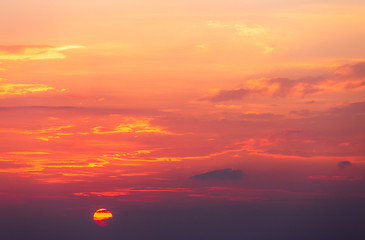 colorful dramatic sky with cloud at sunset.