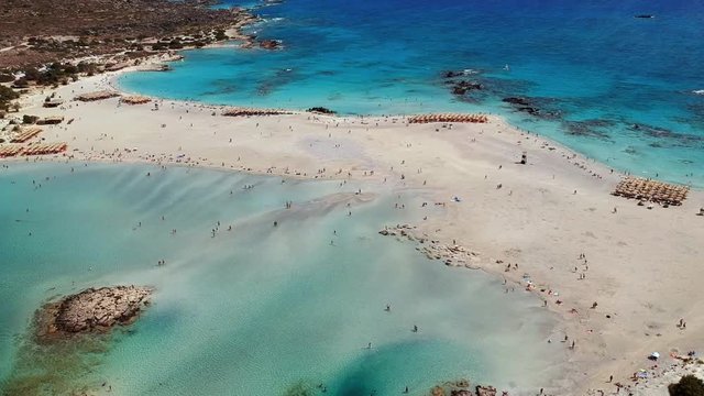 Aerial shot of this blue and turquoise waters of the white sand beach Elafonissi in Crete, Greece