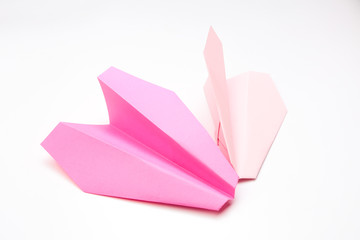 Colorful paper plane on white background, Business competition concept