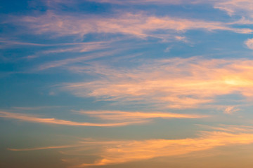 colorful dramatic sky with cloud at sunset.