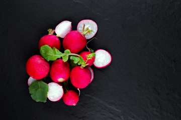 Red fresh radish on wooden
