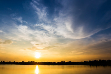 colorful dramatic sky with cloud at sunset.