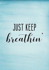 Just keep breathing quote with blue watercolor background. Ariana Grande song lyrics.