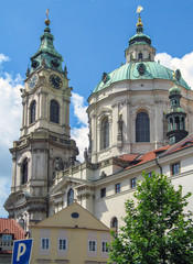 Fototapeta na wymiar Bell tower of st.Nicholas church, baroque church in the Lesser Town of Prague, Czech Republic