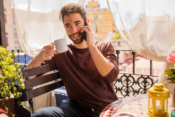 young man drinking a coffee