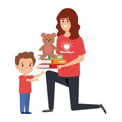 woman volunteer giving a boy books and bear teddy