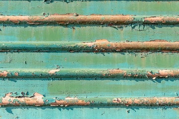 Old cracked Rusty paint metal background texture close-up