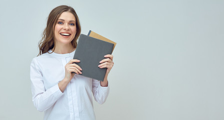businesswoman accountant wearing white shirt holding book