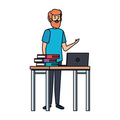 young teacher in desk with laptop and books