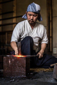 Swordsmith making Japanese swords