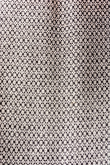 Woolen fabric with patterns, natural, beautiful texture and a gentle background.
