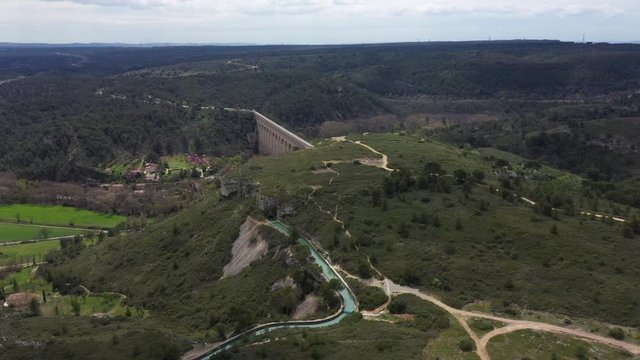 The Canal de Marseille and aqueduct de Roquefavour aerial drone shot cloudy day