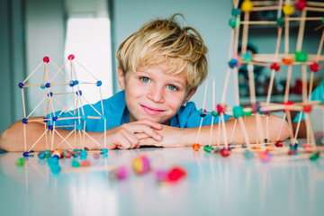 cute boy making geometric shapes, engineering and STEM