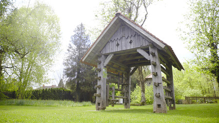 Hay rack on green lawn