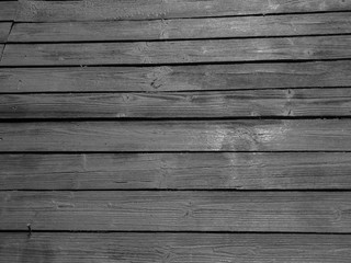 Black and white fence. Black and white wooden fence.