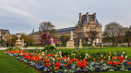 Marvelous spring Tuileries garden and view at the Louvre Palace Paris France. April 2019. 