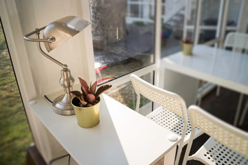 White table and chair in cargo container living room