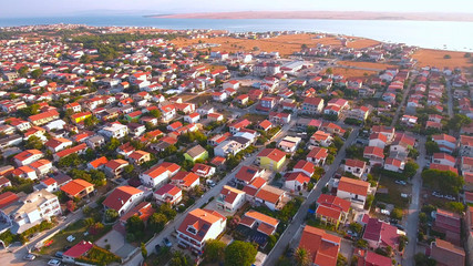 Naklejka premium Aerial shot of apartments town at the sea