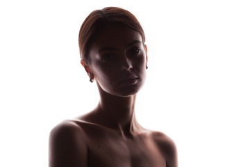 silhouette of young adult woman with clean fresh skin