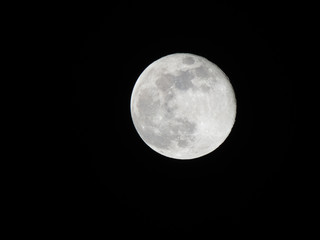 Full moon on dark night sky