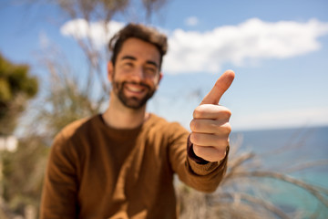 ok gesture made by a young man