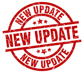 new update round red grunge stamp