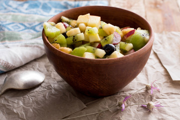 Fruit salad.  Kiwi, banan, apple. Vitamin. Top view. Diet. Dinner. Homemade