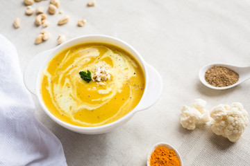 Homemade dieting cream soup with pumpkin, cream, cabbage spices, salt and ginger.