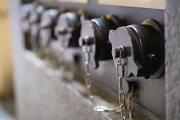 closeup of the water pump on the building wall