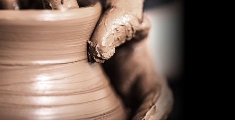 Hands of potter making clay pot - obrazy, fototapety, plakaty