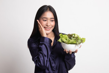 Healthy Asian woman with salad.