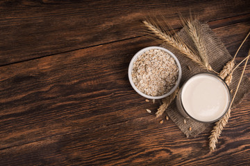 A glass of oat milk and cereal oatmeal