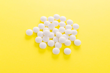 White medical pills and tablets