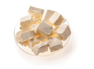 butter in glass plate (beautiful shape) on white background